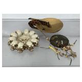 skull-themed ashtray, a wooden dish with a