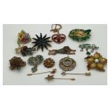 11 Brooches, 1 necklace/brooche, 3 pins, 1