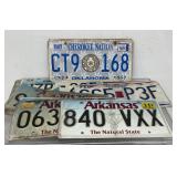 9 license plates, Arkansas, Oklahoma, Missouri