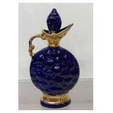 vintage Jim Beam cobalt blue decanter featuring a
