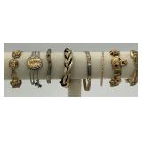 8 vintage gold tone bracelets, 1 bracelet is made