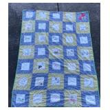 Vintage family quilt with hand embroidered