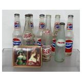 Vintage glass Pepsi bottles and Pepsi cola