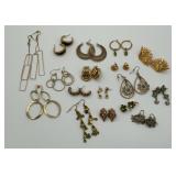 17 pairs of gold tone earrings
