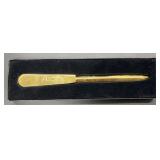 Gold Tone Samoa letter opener, 7.5in long