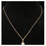 18kt (750) gold chain, 14kt gold pearl pendant,