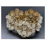 Gold tone bracelet with clear beads, brand