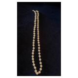 Ivory colored pearl strand no clasp