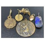 6 vintage necklace pendants.