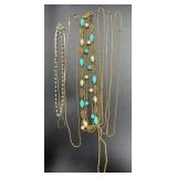6 Gold tone necklaces