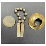 Vintage brooches and sweater clip