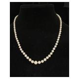 14k gold pearl necklace 13g, 7mm wide largest