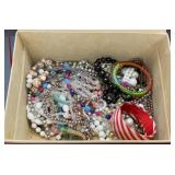 Red box full of craft jewelry 10x8x5