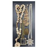 4 Necklaces and a necklace pendant