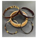 5 Thick plastic brown bracelets