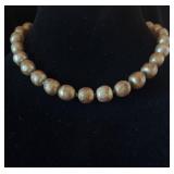 Copper colored beaded necklace