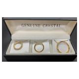 3 Gold tone necklaces, new in box.