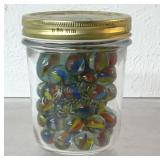 Vintage marbles in jar, jar is 4 inches tall
