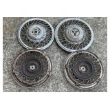 4 vintage Cadillac  wire spoke wheel covers