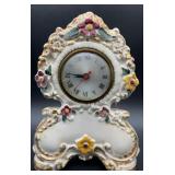 Vintage electric mantle clock featuring a