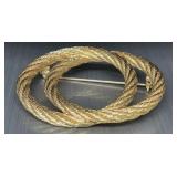 Vintage gold tone brooch