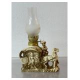 Vintage porcelain oil lamp featuring a