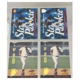 4 Derek Jeter baseball cards