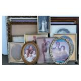 12 Picture frames. 2 oval frames larger one is