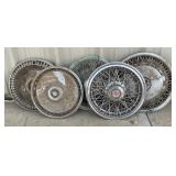 5 Vintage Buick hub caps.