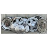 7 Vintage Ford wheel covers and 3 Vintage ford