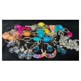 8 Vintage costume earrings, and a peachy keen