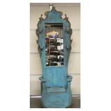 Wooden hall tree with mirror, coat hooks, and