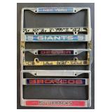 4 License plate covers. Metal Razorbacks. Metal