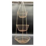 Vintage white three-tier hanging wire basket. Has