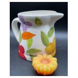 Laurie Gates ceramic pitcher with colorful flower