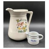 Vintage Monmouth pottery milk pitcher with the
