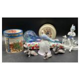 Vintage porcelain bell with a blue bird atop a