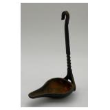Antique cast iron Betty lamp, 7.5 inches tall