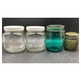 Green glass and ceramic jars with hinged metal