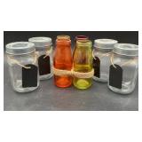 4 Colored glass milk style bottles. 3 clear glass