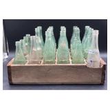 Vintage glass bottles with wooden crate,