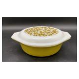 Vintage green glass PYREX casserole dish with
