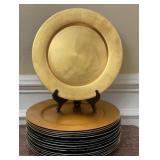4 gold Garden Ridge charger plates and 12 silver