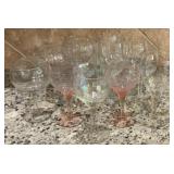4 UV glow Iridescent wine glasses and 7 clear