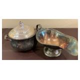 Silver plated gravy boat made in India. 9in long.