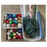Christmas lights, ball ornaments, beads, wrapping