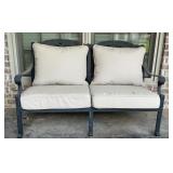 Black cast aluminum chair, 35 inches tall x 54.5