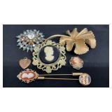 Vintage Cameo brooch with a black background and