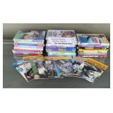 Lot of 31 Assorted DVDs Including Wee Sing