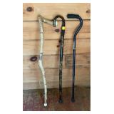 3 walking canes, wooden one is 38 inches tall